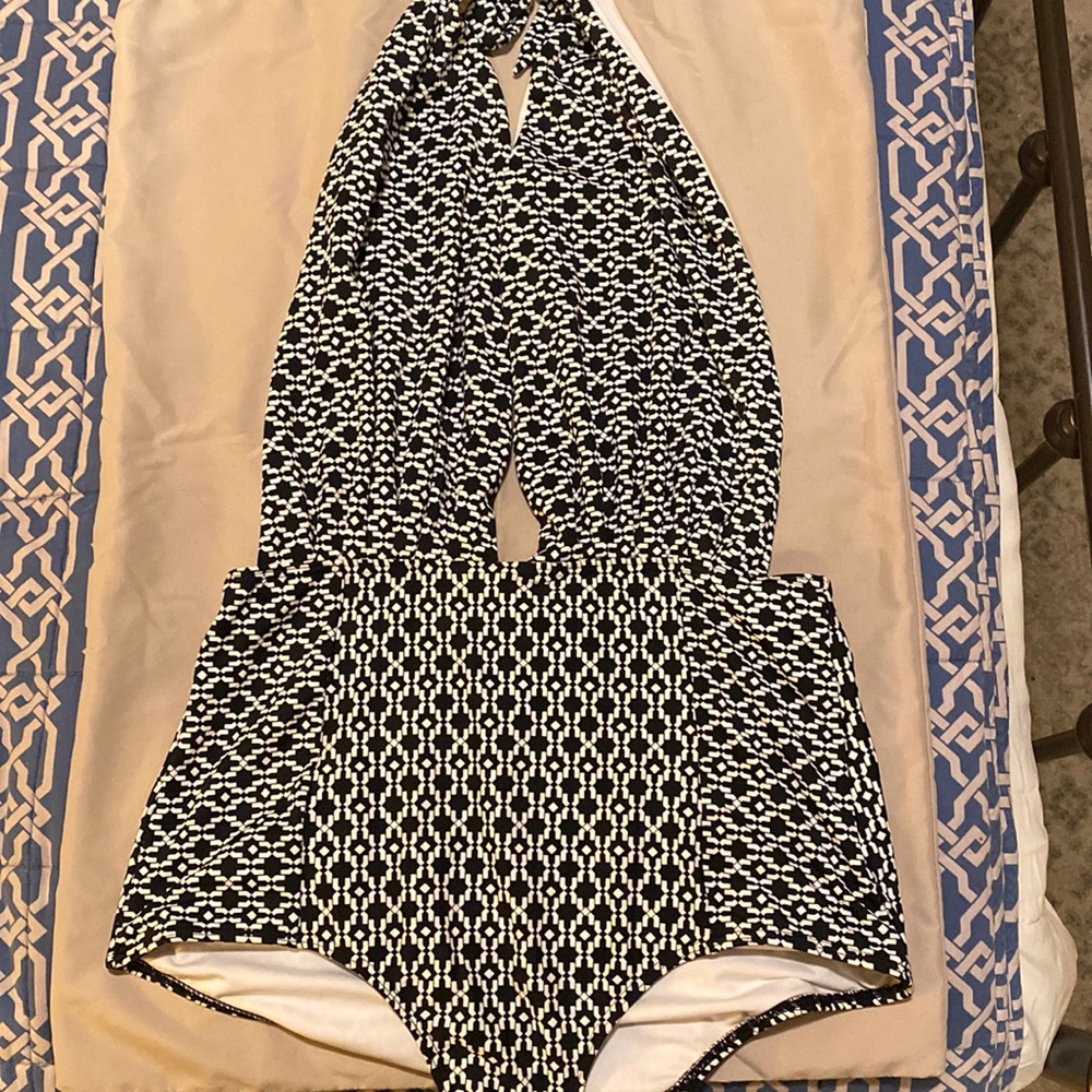 Vintage-style one piece bathing suit. Halter top